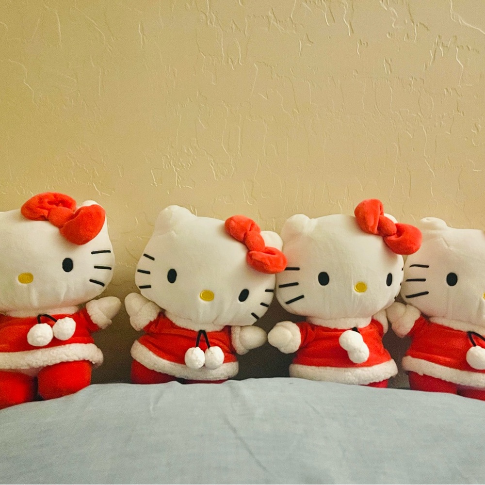 Set of Four Hello Kitty Plush Toys in Red Christmas Outfits